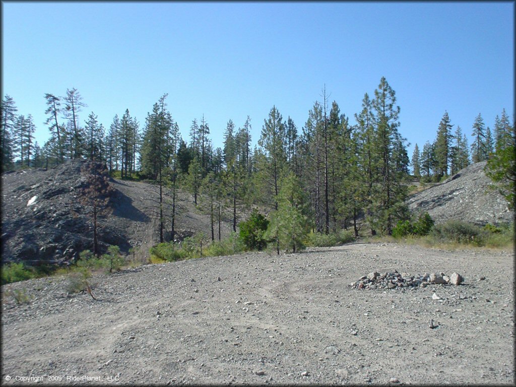 Primitive campsite next to ATV trail.