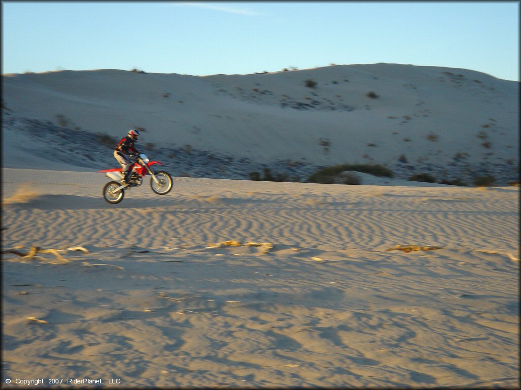 Honda CRF Motorcycle doing a wheelie at Rasor OHV Area