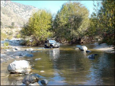 4WD vehicle traversing the water at San Gabriel Canyon OHV Area