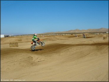 KTM Dirt Bike getting air at Cal City MX Park OHV Area