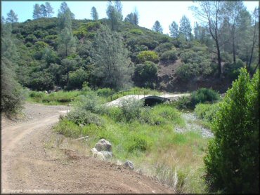 Small concrete bridge that leads to Hunting Creek campground.