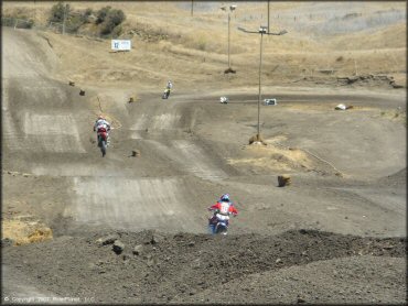 Honda CRF Motorbike jumping at Club Moto Track