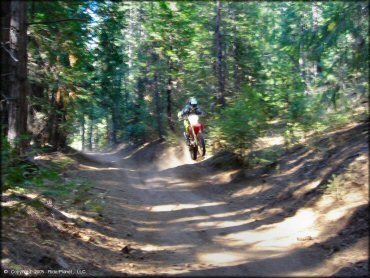 Honda CRF Dirt Bike jumping at Gold Note Trails