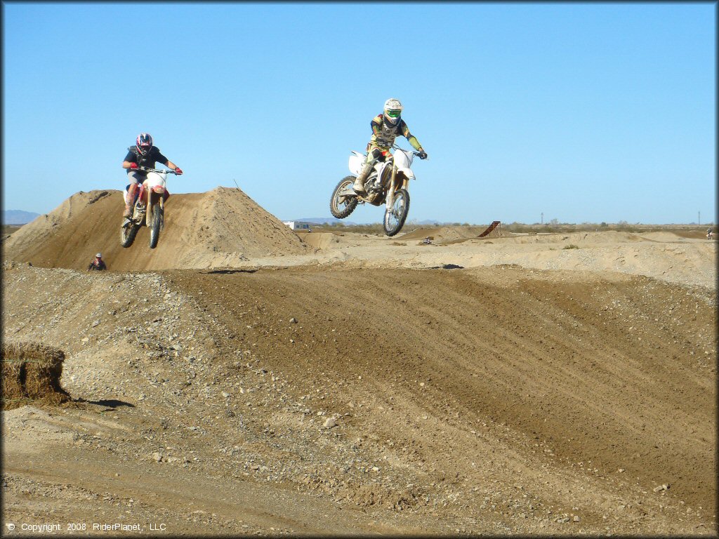 Honda CRF Dirt Bike catching some air at River MX Track