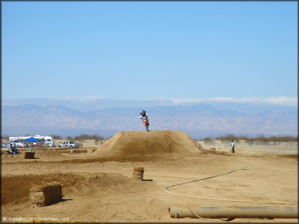 Honda CRF Motorbike jumping at Cal City MX Park OHV Area