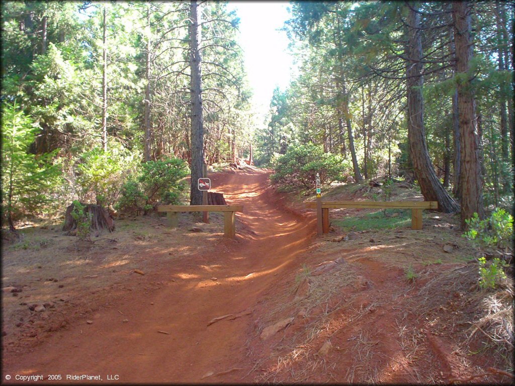 Forest Service sign prohibiting trucks on trail - ATVs, UTVs and dirt bikes only.