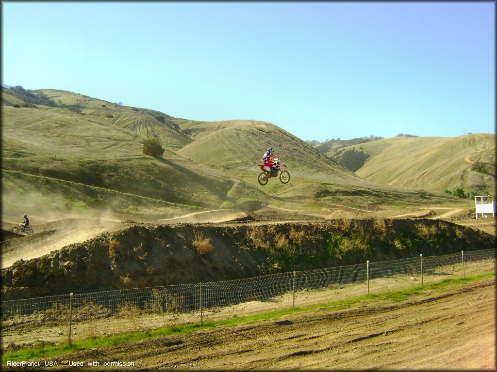 Honda CRF Dirt Bike jumping at Carnegie SVRA OHV Area