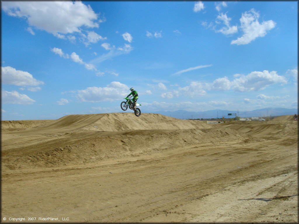 Kawasaki KX Motorcycle jumping at AV Motoplex Track