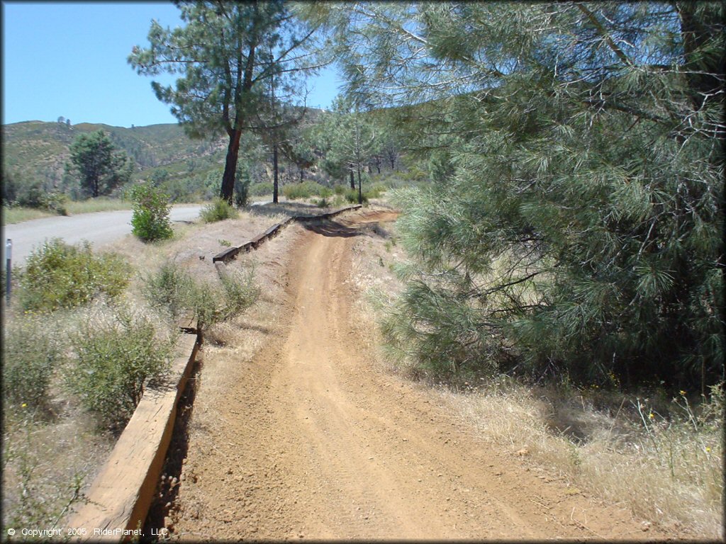 A scenic portion of the ATV trail lined with wooden 2x4s.